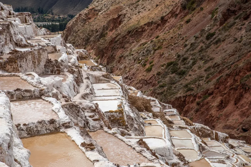 ATV riders on the dirt road to Moray in the dry season — the best time for ATV tours in Cusco
